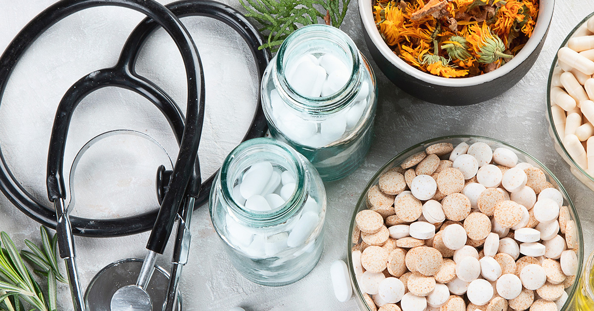 natural medicine with stethescope and herbs